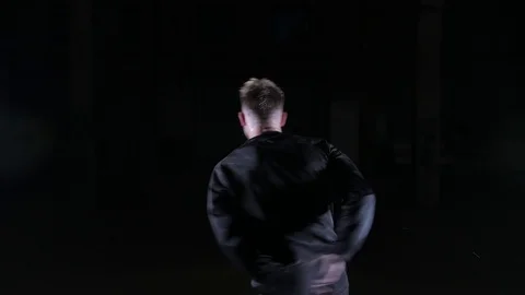 Young guy dancing breakdance, hiphop, street dancing in the studio, isolated Stock Footage 121515142