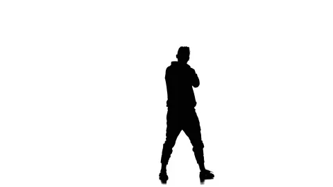 Young guy dancing hip hop, freestyle, street dance, slow motion, silhouette Stock Footage 130335650