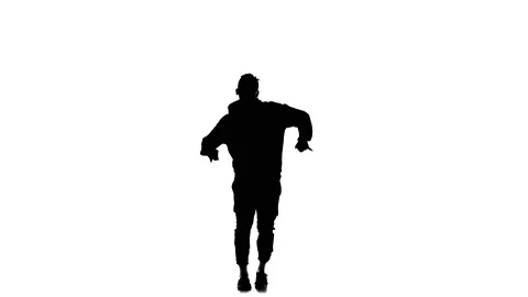 Young guy dancing hip hop, freestyle, street dance, slow motion, silhouette Video stock 130335970