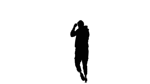 Young guy dancing hip hop, freestyle, street dance, slow motion, silhouette Stock Footage 130335977