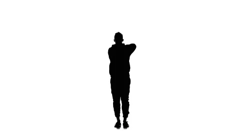 Young guy dancing hip hop, freestyle, street dance, slow motion, silhouette Stock Footage 130336004