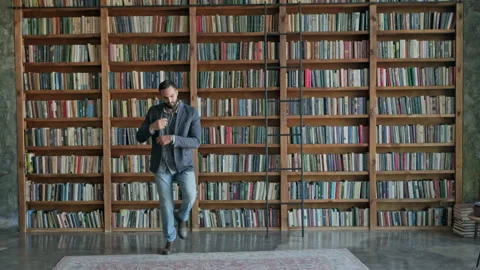 Young Guy Dancing In The Library. Stock Footage 140221951