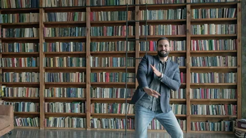 Young Guy Dancing In The Library. Stock Footage 140221970