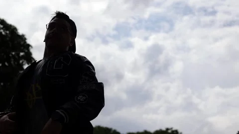 A young guy is dancing on the street. Stylish and modern dance Stock Footage 247700136