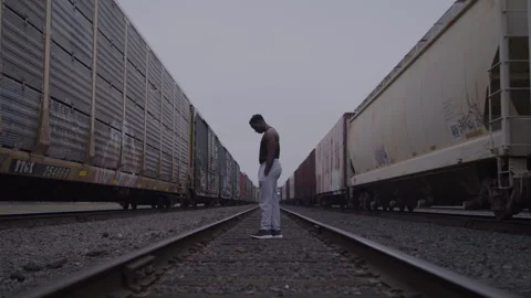 Young Guy Deep In Thought On Train Tracks Stock Footage 270326947