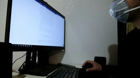 Young guy do Smart computer working with safety mask in covid19 virus quarantine Stock Footage 126144807