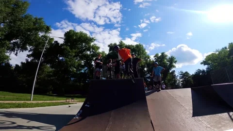 A young guy does tricks on a bicycle at a skatepark in Sumy, Ukraine Stock Footage 276904290