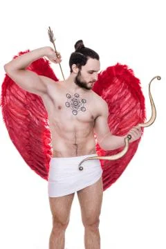Young guy dressed like Cupid with bow and arrows. Valentine, Archangel, Angel Stock Photos