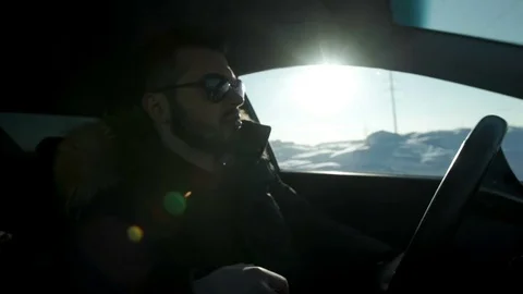 Young guy is driving a car Stock Footage 82144960
