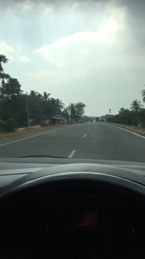 A young guy driving car on Indian Road Highway Stock Footage 138792341