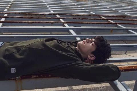 A young guy of Eastern appearance with black hair and a handsome expressive face Stock-Fotos