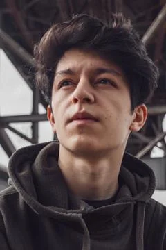 A young guy of Eastern appearance with black hair and a handsome expressive face Stock-Fotos