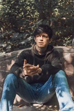 A young guy of Eastern appearance with black hair and a handsome expressive face Foto stock