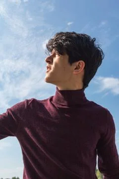 A young guy of Eastern appearance with black hair and a handsome expressive face Foto stock