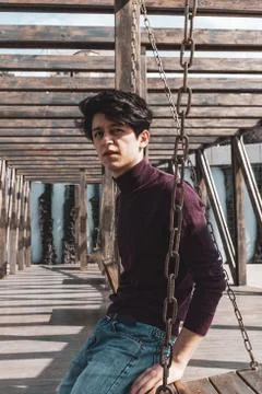 A young guy of Eastern appearance with black hair and a handsome expressive face Stock-Fotos