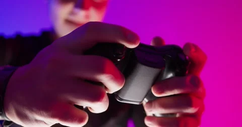 Young Guy Enthusiastically Playing in Video Games on TV Console. Stock Footage 150749762