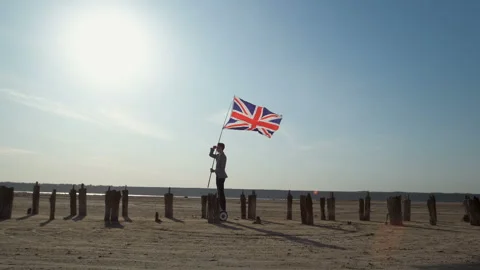 Young guy with the flag of Great Britain. Stockbeeldmateriaal 137950406