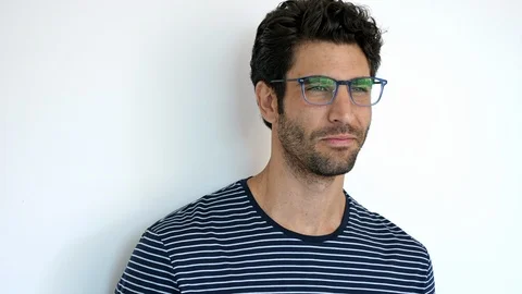 Young guy in glasses Stock Footage 89518418