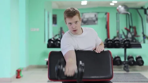 A young guy in the gym Stock Footage 71220076