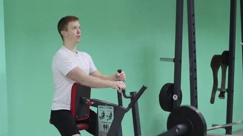 A young guy in the gym Stock Footage 71220276
