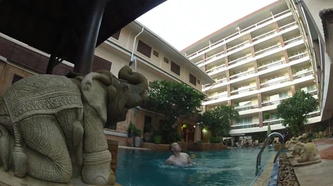 Young guy have fun in the pool Stock Footage 35998471