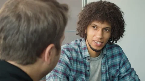 Young guy having a job interview Видео 144991954