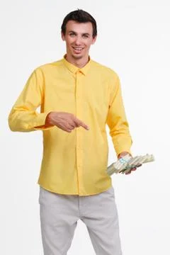 Young guy holding money. Stock Photos