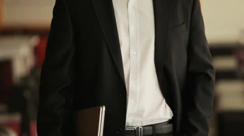 Young guy with a laptop smiling Stock Footage 22769723