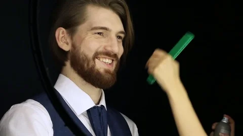 Young guy laughing and smiling during studio fashion shooting Stock Footage 74158519