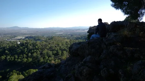 Young guy looking at landscape Stock Footage 103311196