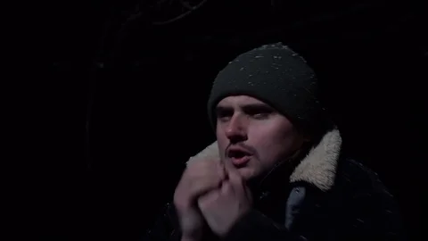 The young guy looks in different directions Stock Footage 122237355