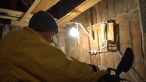 Young guy is a master working in his workshop with wood Video stock 125858992