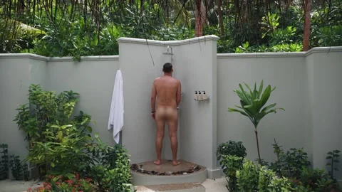 Young guy masturbates in the shower Stock Footage 146652008