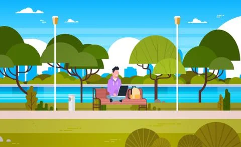Young Guy In Park Using Laptop Computer Outdoors Sitting On Bench イラスト素材