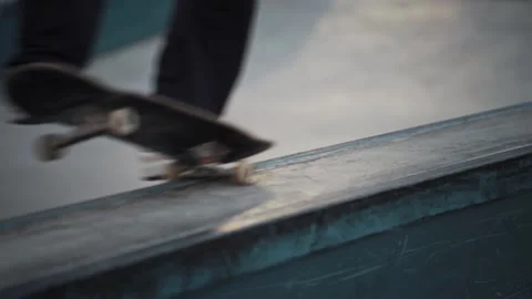 A young guy perform skateboard jumping stunts. Extreme sport. Male skateboarder Stock Footage 165696221