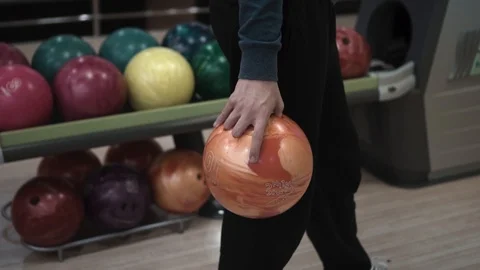 The young guy playing in bowling Stock Footage 99044276