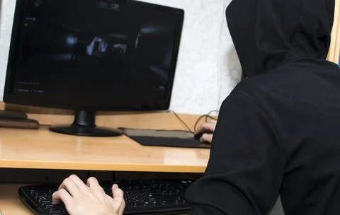 Young guy playing computer game Stock Photos