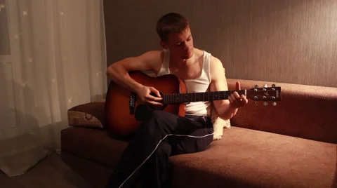 Young Guy Playing Guitar. Full HD 1080. Video stock 42518173