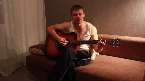 Young Guy Playing Guitar, Sound. Full HD 1080. Video stock 42519930