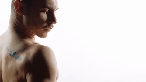 Young Guy Posing Showing The Muscles Of His Body. Stock Footage 130132129