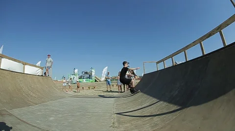 Young Guy Practicing rollerblading on The Ramp Stock Footage 59437756