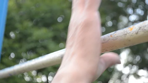 Young guy pulls up on the bar Stock Footage 110812598