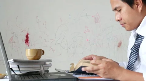 Young guy reading a book Stock-Footage 64848994