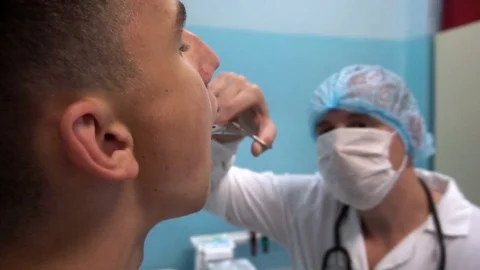 The young guy on reception at the dentist. Dental treatment Stock-Footage 77196880
