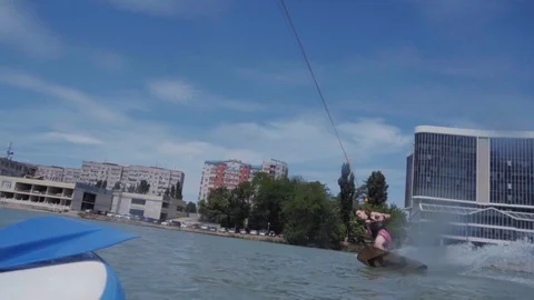 A young guy is riding a hydrocycle on the lake Stock Footage 92785643