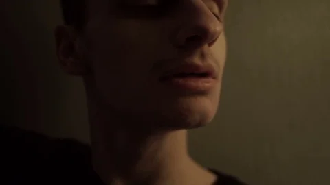 Young guy says something Stock Footage 77383018