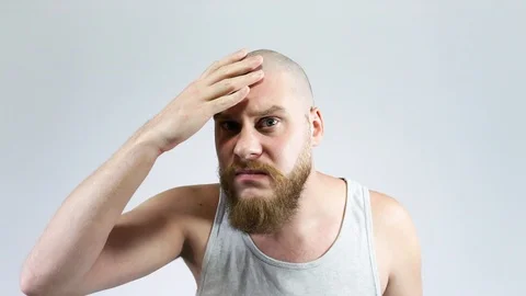 A young guy sees in the reflection of my bald hairless head. Stock Footage 122512260