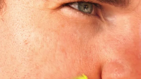 Young guy shaves his temples, cheeks and chin with a razor Vídeo Stock 283938635