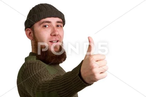 Young guy showing a success sign Stock Photos