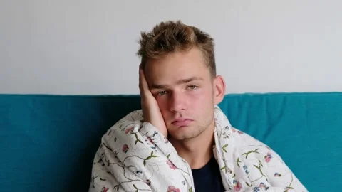 Young guy is sick, holding his head, flu, cold Vídeos de archivo 141527403
